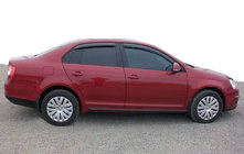 Volkswagen Jetta 2006–2011 Raamwindschermen (set 4 stuks, SIM) foto 1