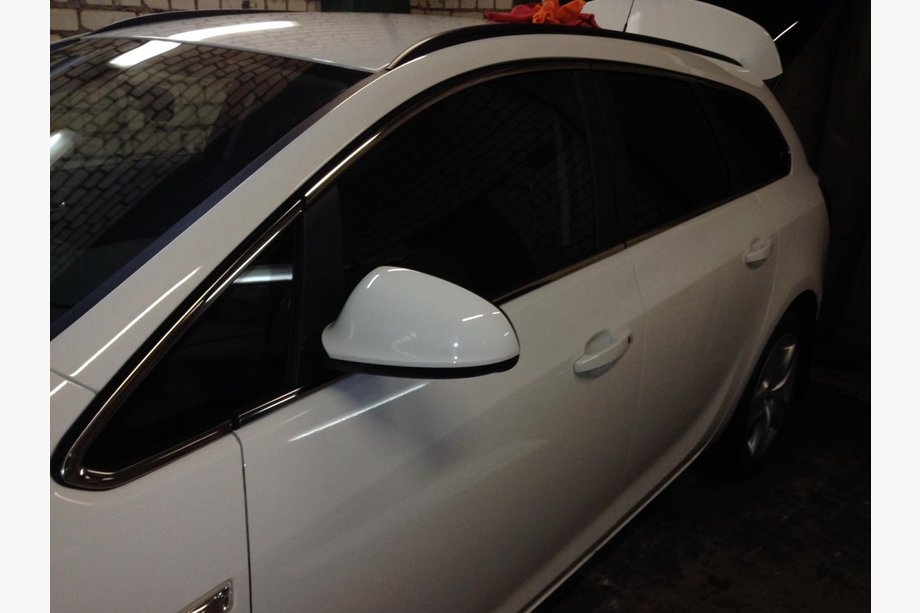 Opel Astra J 2009–2015 Complete raamomlijsting (Sport Tourer, 12-delig, RVS) Foto 3