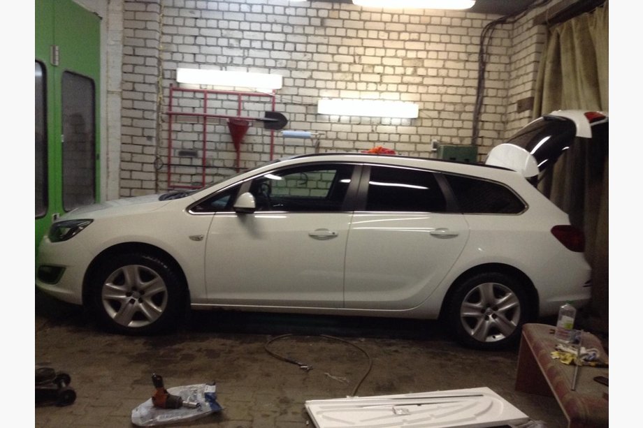 Opel Astra J 2009–2015 Complete raamomlijsting (Sport Tourer, 12-delig, RVS) Foto 4