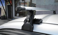 Chevrolet Aveo T250 2005–2011 CAMEL dakdragers (chroom, set van 2) foto 1