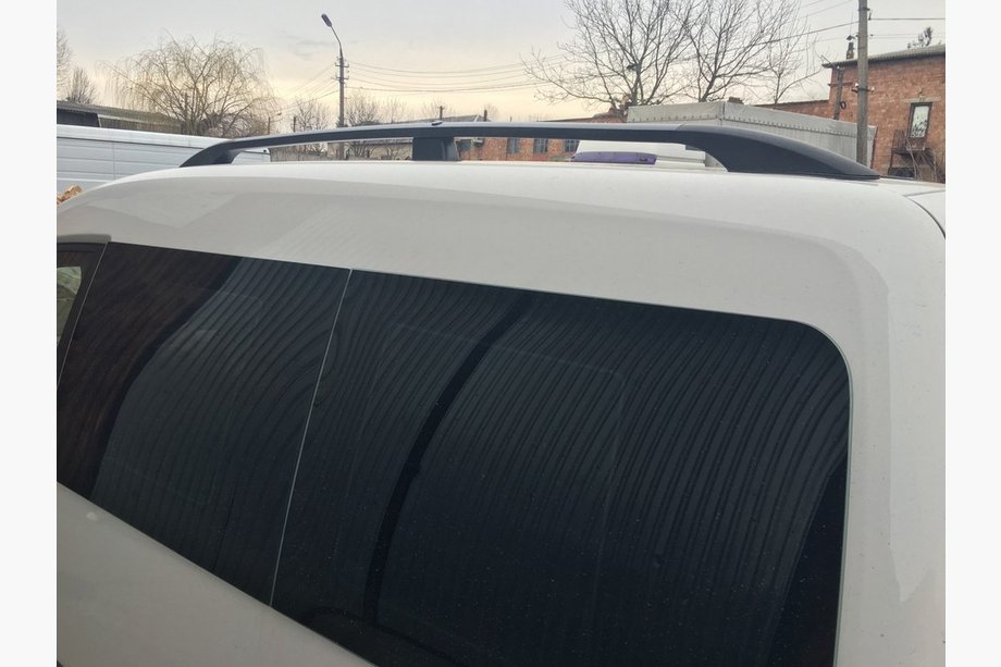 Volkswagen Caddy 2004–2010 Zwarte dakrails Standaard, kunststof voetjes Foto 3