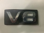 Nissan Patrol Y62 2010–2024 V8-embleem foto 1