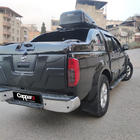 Nissan Navara 2006–2015 Achterklep afdeklijst (ABS) foto 2