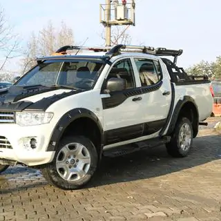 Bovenste deurlijsten (4 stuks, ABS) Mitsubishi L200 2006–2015 foto 3