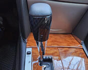 Toyota Land Cruiser Prado 150 2009–2023 Pookknop (zwart leer + carbon) foto 2