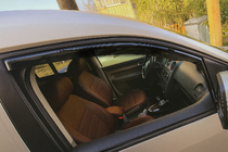 Volkswagen Caddy 2004–2010 Raamwindschermen (inbouw) Niken Luxury (2 st.) foto 1