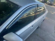 Skoda Rapid 2012–2019 Windschermen met chromen sierlijst Niken Luxury (4 stuks) foto 1