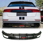 Audi Q8 2018– Achterbumper diffuser (carbon) foto 1