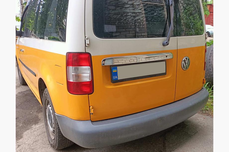 Volkswagen Caddy 2010–2015 RVS sierlijst boven kentekenplaat (2-deurs) Image