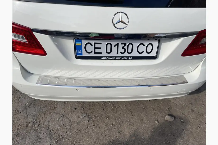 Mercedes E-class W211 2002–2009 Achterbumperlijst Carmos (SW, RVS) Foto 3