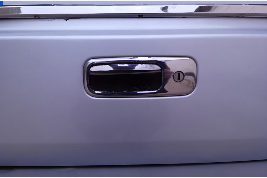 Volkswagen Caddy 2004–2010 RVS afdekking voor kofferklephandgreep Image