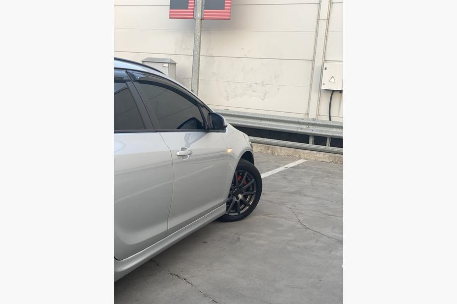 Opel Astra J 2009–2015 Zijskirts HB/SW (spuitklaar) Foto 4