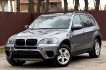 BMW X5 E70 2007–2013 OEM spatbordrandlijsten (sierlijsten) Rechtsachter (1 st.) foto 1