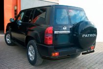 Nissan Patrol Y61 1997–2011 Achterhoeken AK003 Black (2 stuks, RVS) foto 1
