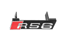 Audi RS6 V1 grille-embleem foto 1