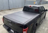 Toyota Hilux 2015– 4-delige opvouwbare laadbakafdekking foto 1