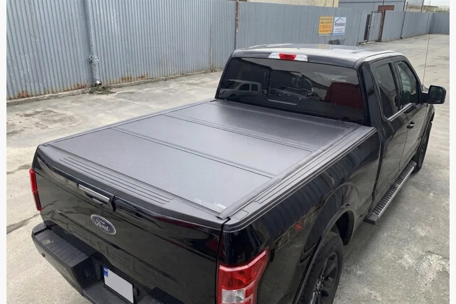 Toyota Hilux 2015– 4-delige opvouwbare laadbakafdekking Image