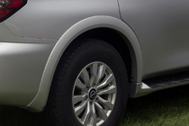Nissan Armada 2016–2024 Achterste wielkastverbreders (origineel, gebruikt) foto 1