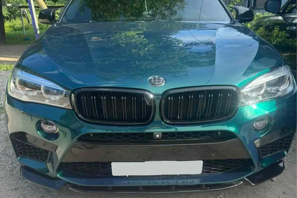 BMW X5 F15 tuning: spiegelkappen, spoiler en frontlip Foto 7