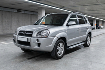 Hyundai Tucson JM 2004– Zijsteps Allmond Grey (2 stuks, aluminium) foto 1