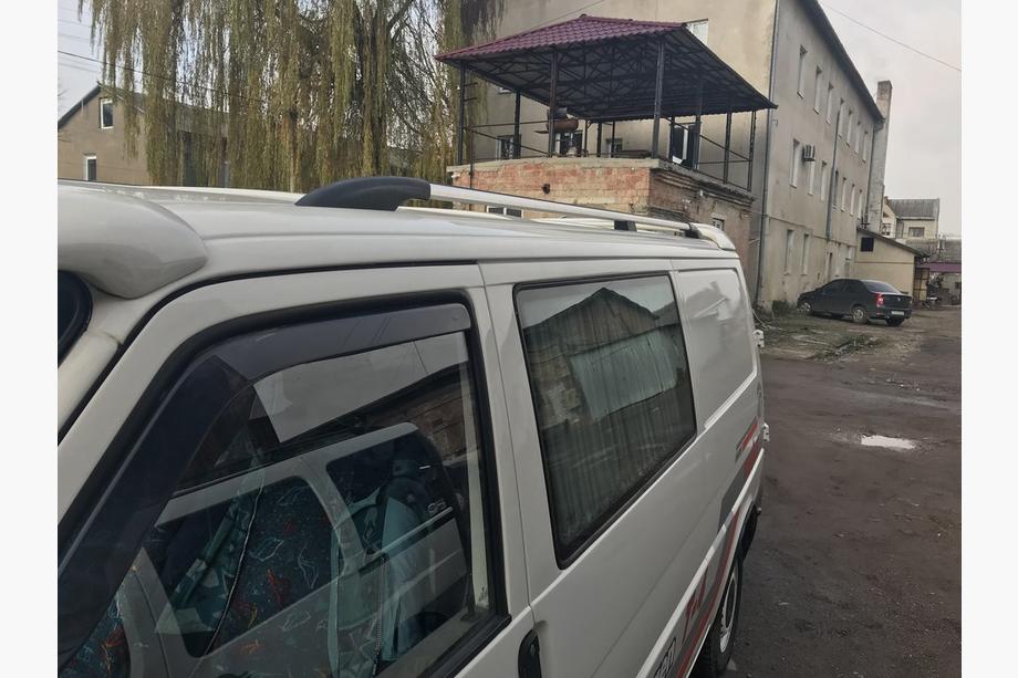 Volkswagen T4 Caravelle/Multivan 1990–2003 Chromen dakrails DORA (metalen bevestiging) Foto 3