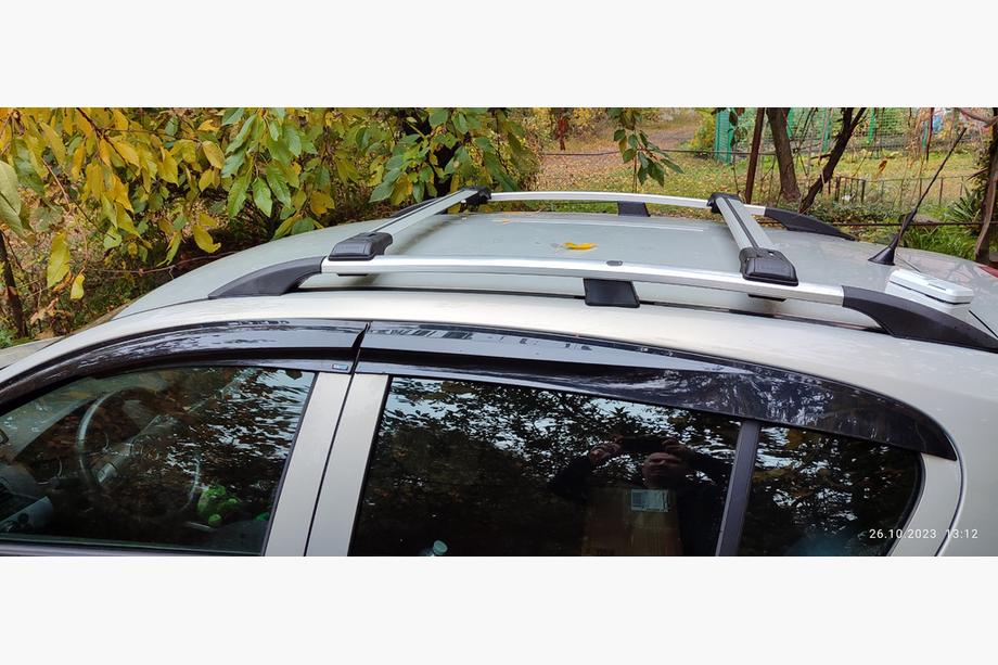 Opel Astra H 2004–2013 Dwarsdragers voor standaard dakrails, afsluitbaar met sleutel (2 stuks) Image