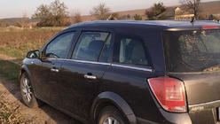 Opel Astra H 2004–2013 Buitenste raamomlijsting (RVS) foto 5
