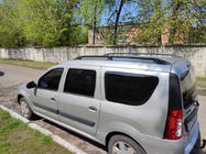 Renault Logan MCV 2005–2013 Zwarte dakrails Gietijzeren voeten foto 2