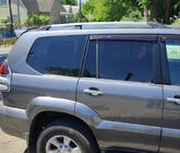 Toyota Land Cruiser Prado 120 2002–2009 Turkse chromen dakrails Kunststof voetjes foto 1