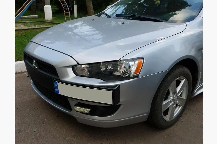 Mitsubishi Lancer X 2008– Kentekenplaathouder (kunststof) Mat zwart Image