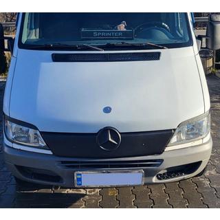 Winterafdekking voor de grille
