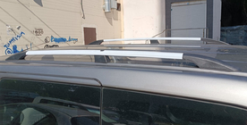 Nissan NV200 2009– Chroom dakrails 143 cm, gietijzeren voeten foto 12