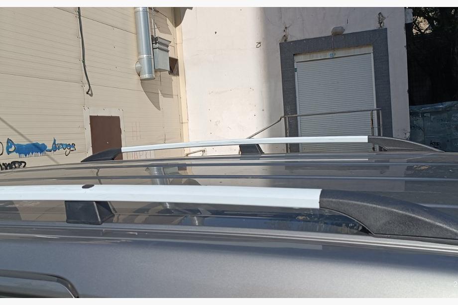 Nissan NV200 2009– Chroom dakrails 164 cm, gietijzeren voeten Foto 11