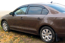 Volkswagen Jetta 2011–2018 Raamdeflectoren (4 stuks, HIC) foto 5