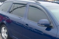 Skoda Octavia II A5 2006–2010 Raamdeflectoren SW (4 stuks, HIC) foto 1