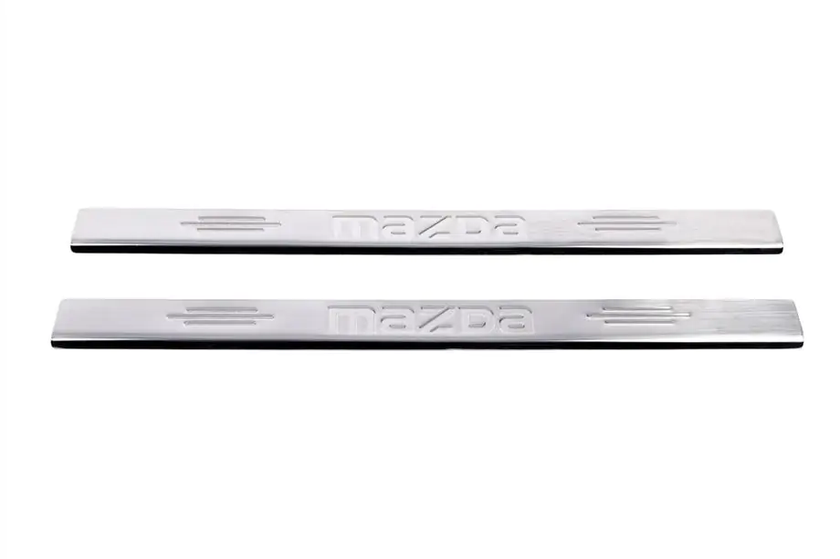 Mazda 2 2003–2007 Carmos RVS dorpellijsten V-1 Foto 2