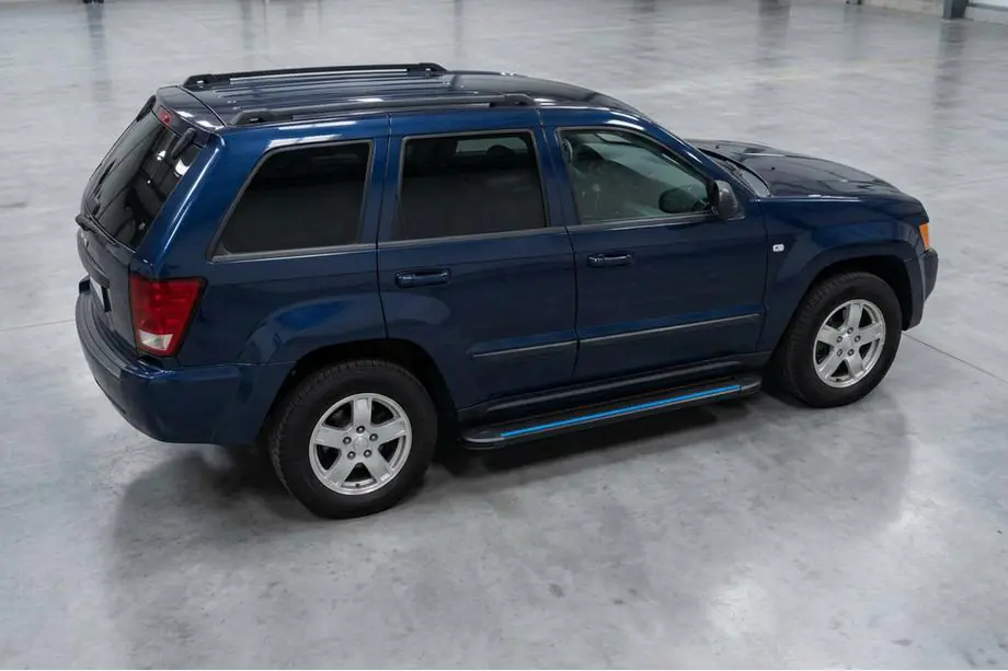 Jeep Grand Cherokee WK 2004–2010 Maya Blue sidesteps (2 stuks, aluminium) Image