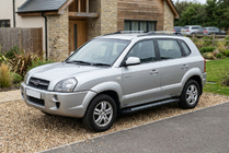 Hyundai Tucson JM 2004– Side steps New Vision Black (2 stuks, aluminium) foto 1