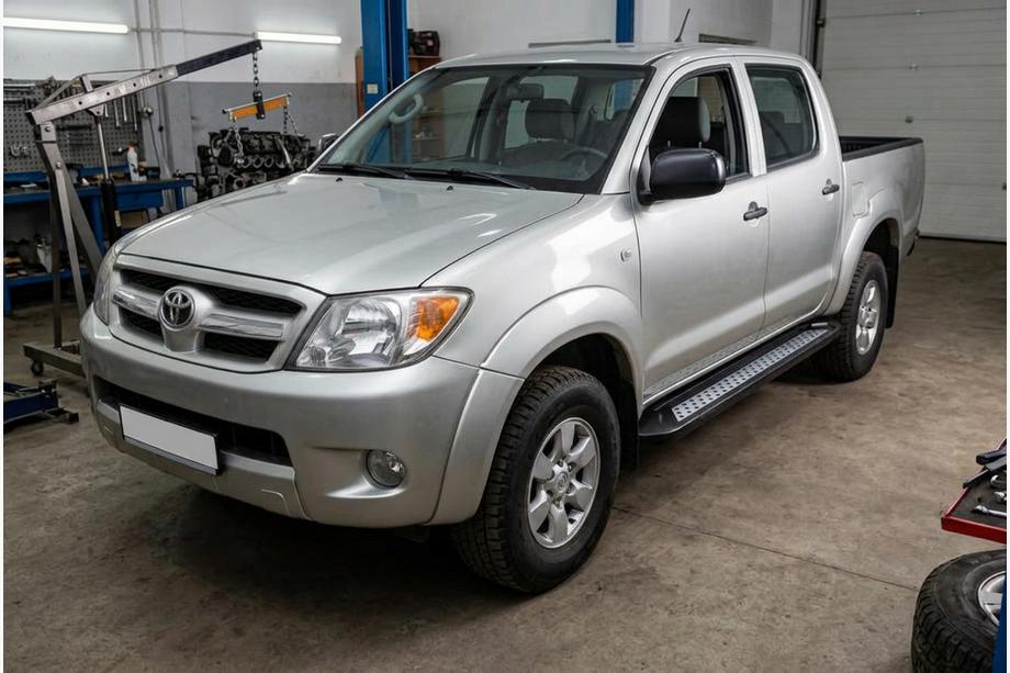 Toyota Hilux 2006–2015 Side steps New Vision Black (2 stuks, aluminium) Foto 1