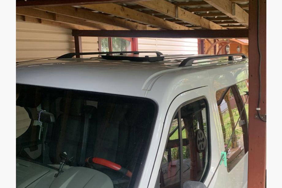 Nissan NV400 2010–2024 Zwarte dakrails Lang, kunststof voetjes Foto 2