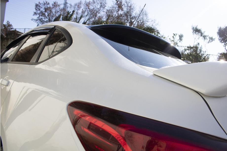 Opel Astra J 2009–2015 Achterruitspoiler Sedan (ABS) Foto 3