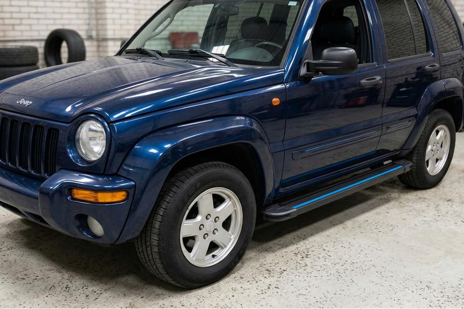 Jeep Cherokee/Liberty 2002–2007 Maya Blue zijtreden (2 stuks, aluminium) Foto 1