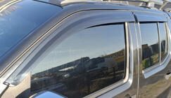Nissan Navara 2006–2015 Raamdeflectoren (4 stuks, Sunplex Sport) foto 1