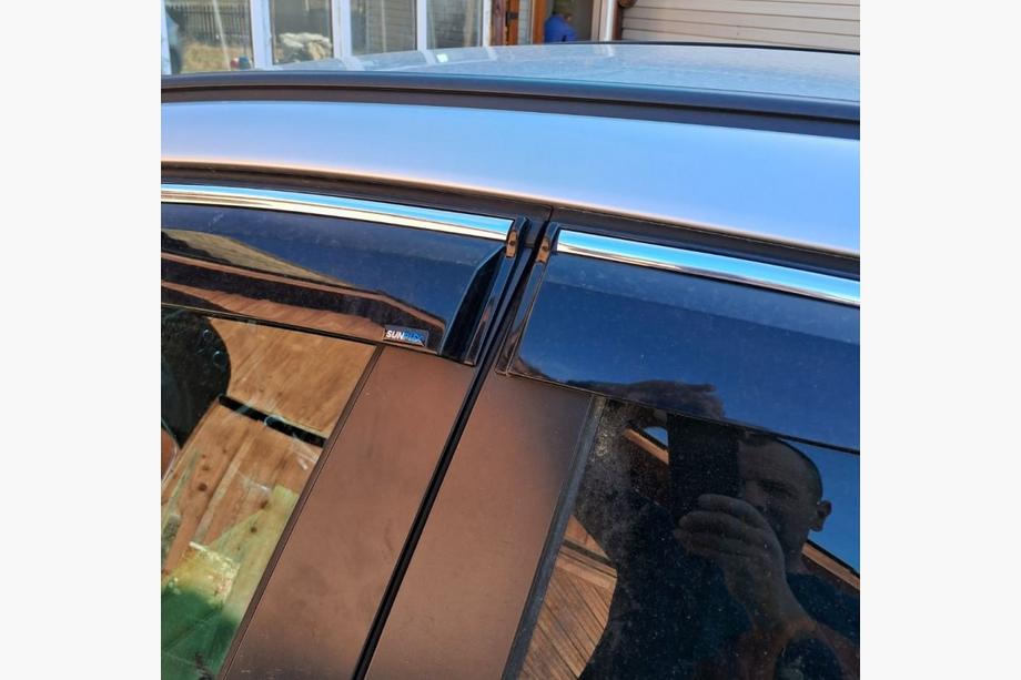 Opel Astra J 2009–2015 Raamwinddeflectoren met chromen strip HB/SD (4 stuks, Sunplex Chrome) Foto 4