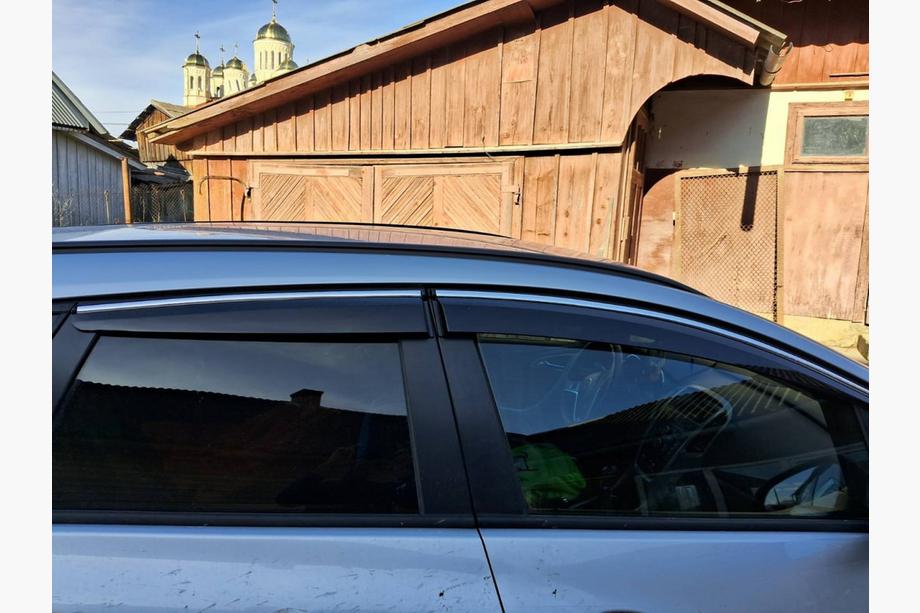 Opel Astra J 2009–2015 Raamwinddeflectoren met chromen strip HB/SD (4 stuks, Sunplex Chrome) Foto 2