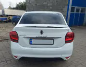 Renault Logan II 2013–2022 Lip spoiler (Sunplex, zwart) (118,5 cm x 5,5 cm) foto 1