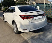 Toyota Corolla 2013–2019 LIP-spoiler (Sunplex, zwart) (118 cm * 6,4 cm) foto 1