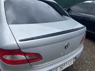 Skoda Superb 2009–2015 LIP-spoiler (Sunplex, zwart) (115,8 cm x 6,3 cm) foto 1