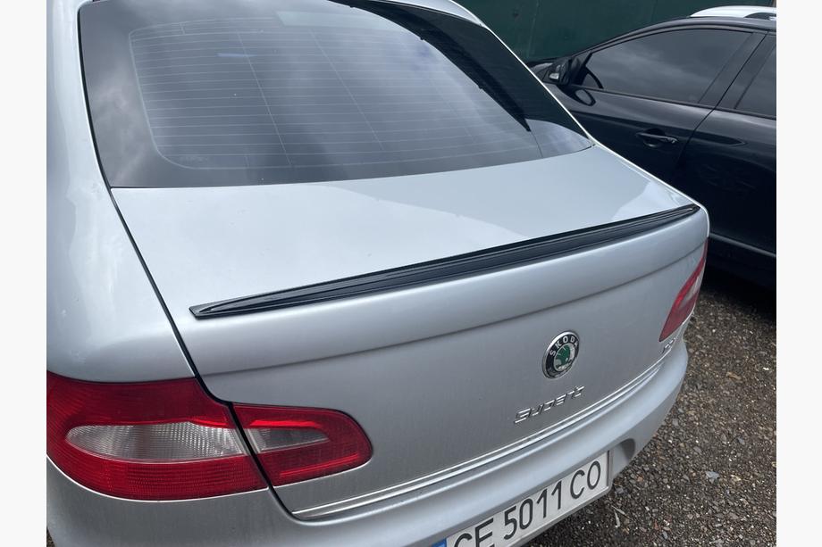 Skoda Superb 2009–2015 LIP-spoiler (Sunplex, zwart) (115,8 cm x 6,3 cm) Image